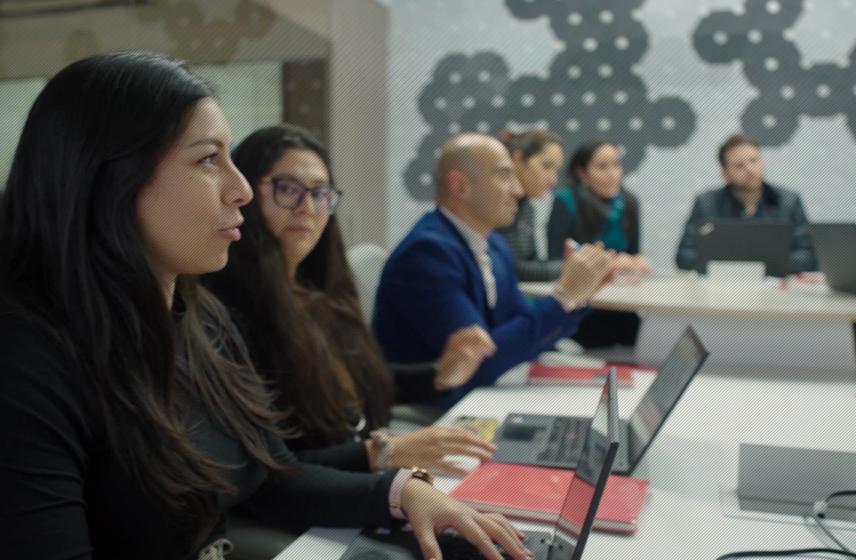 Group of people at a conference table